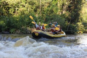 Rafting boat on Jacaré-Pepira river rapids, Brotas