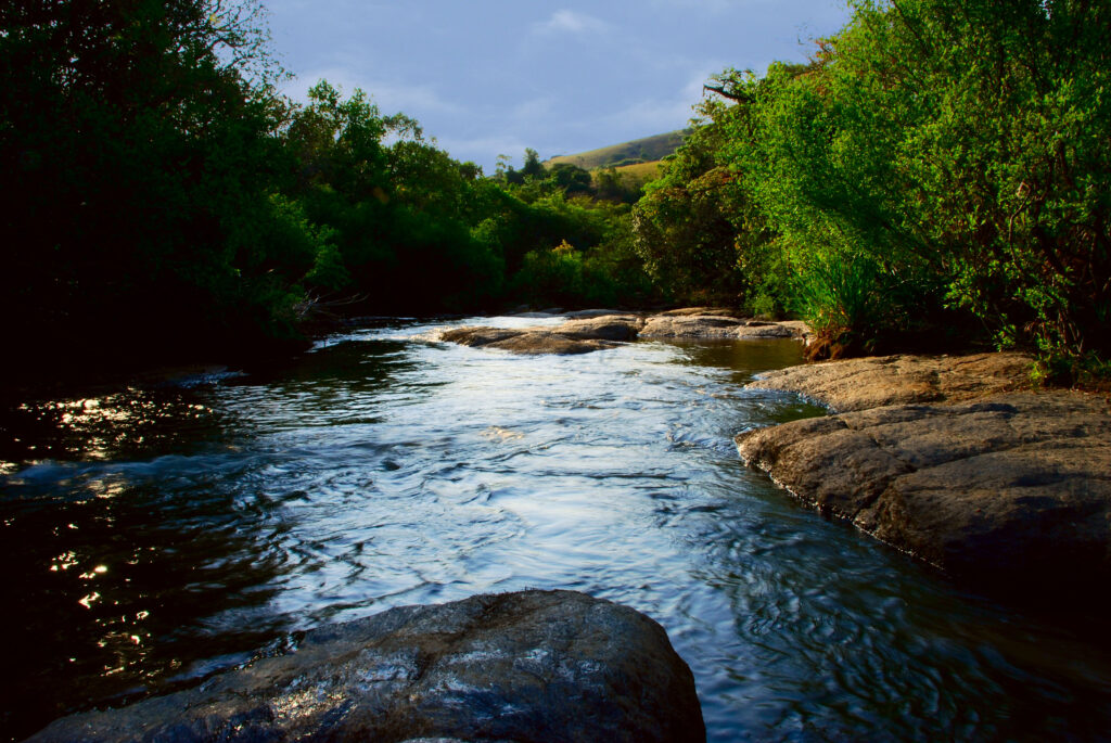 River rapids among rocks and forest in Socorro, São Paulo