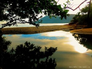 River meets the sea at Praia Preta, Ilha Grande